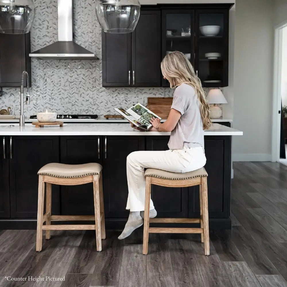Adrien Backless Bar Stool With Saddle Seat And Footrest